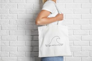 Wave Project cotton canvas tote bag on model