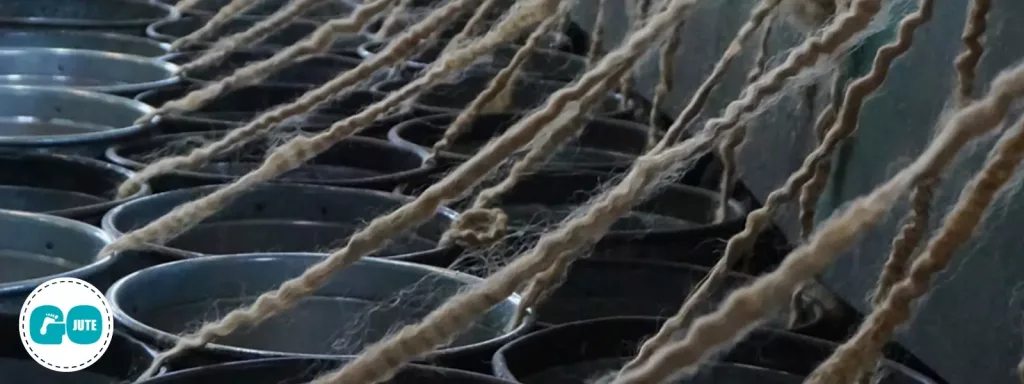 jute string being woven from raw jute fibres in India